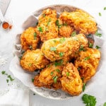 a bowl with crispy and delicious buttermilk fried chicken.