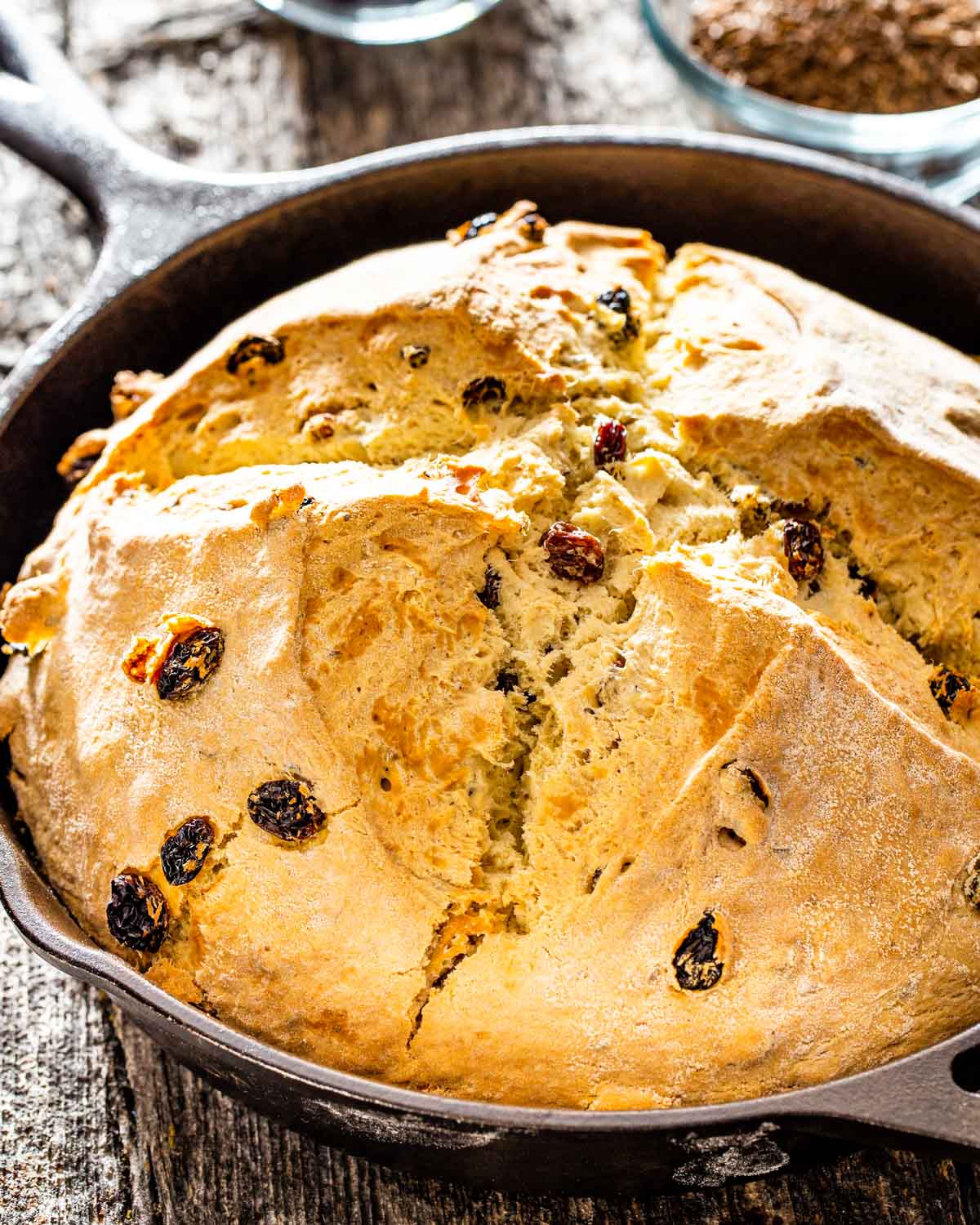 irish soda bread with raisins and caraway seeds in a skillet.