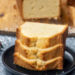 a few slices of pound cake on a black plate.