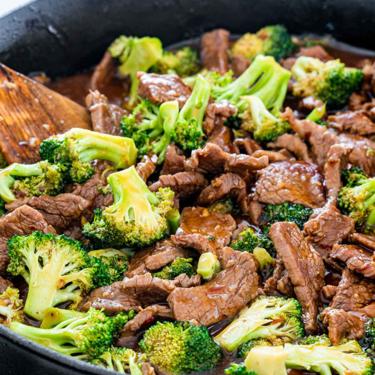 side shot of beef and broccoli in a skillet