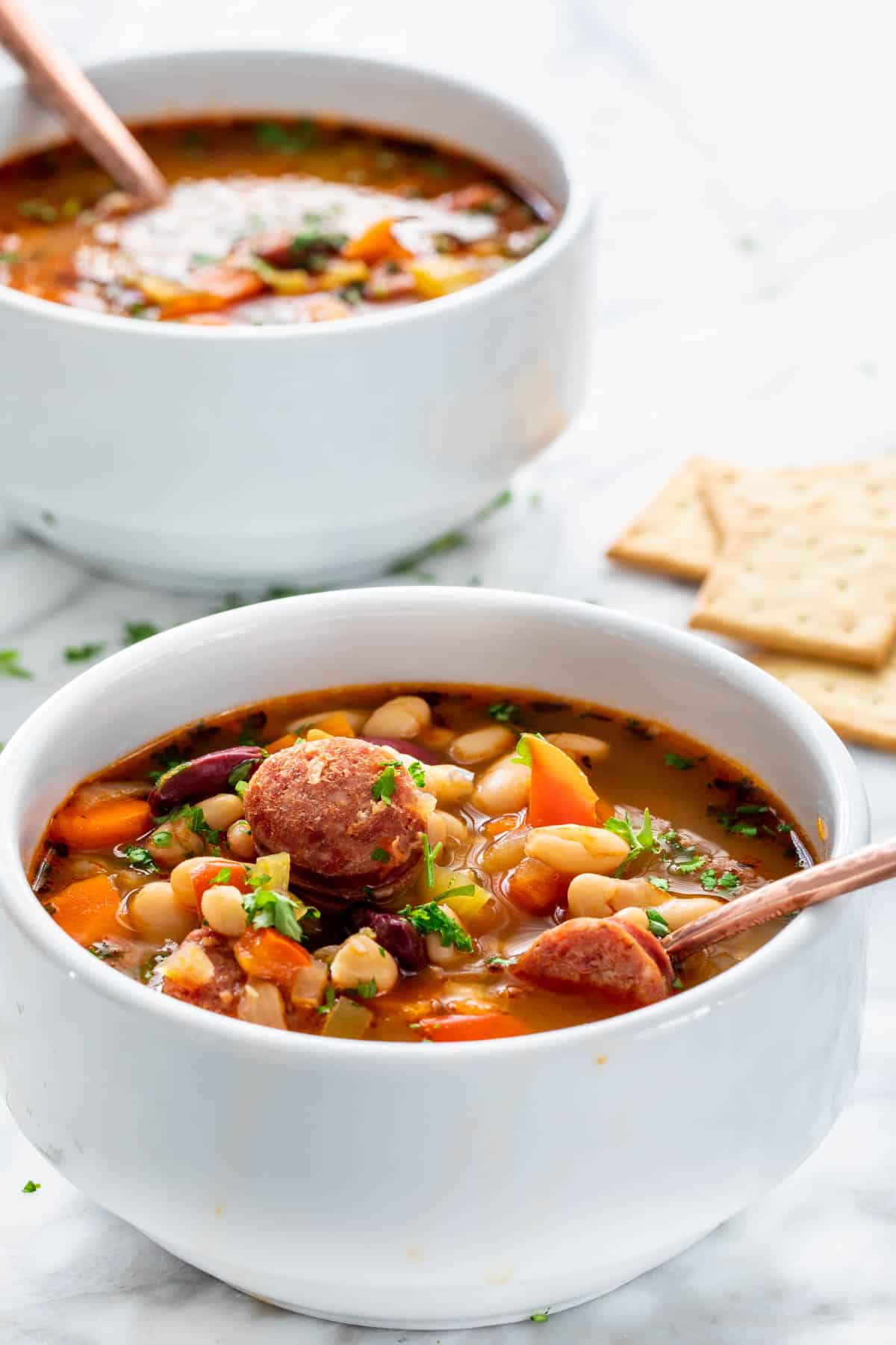 Sausage and Bean Soup in two white bowls