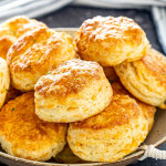 a bunch of cheese biscuits in a bowl.