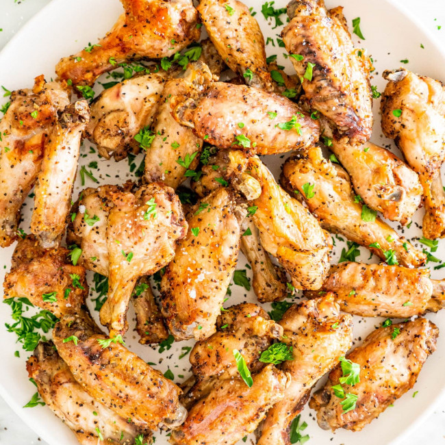 overhead shot of air fryer chicken wings on a plate