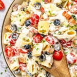 chicken ranch pasta salad in a beige bowl.
