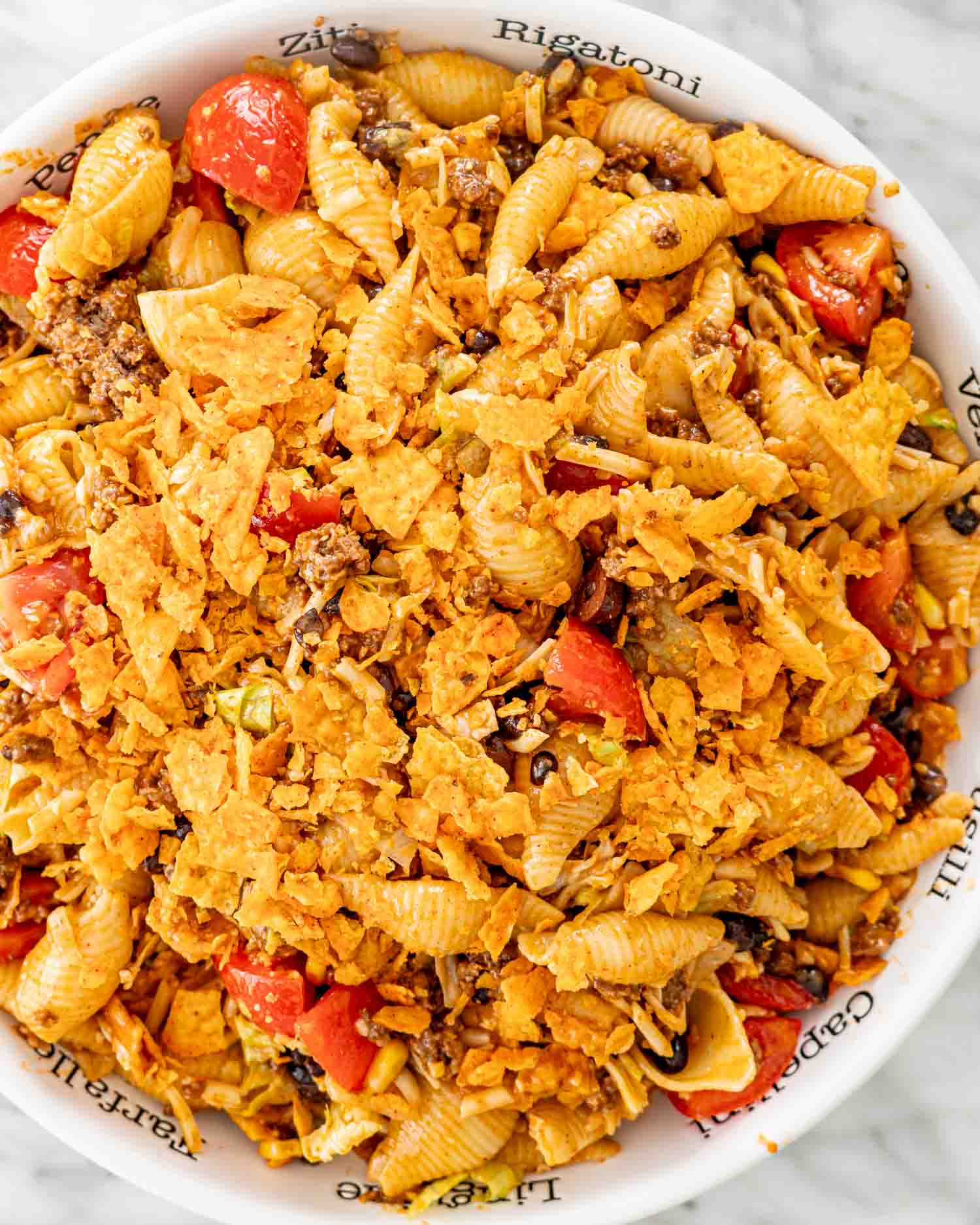 freshly made taco pasta salad in a large bowl.