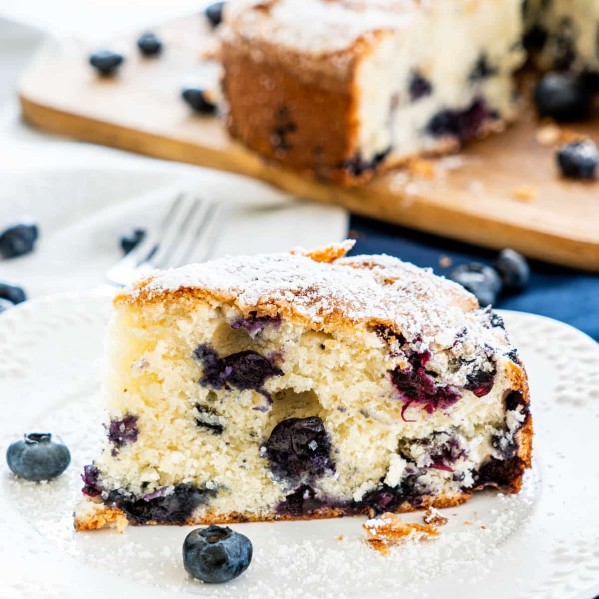 a slice of blueberry cake on a plate