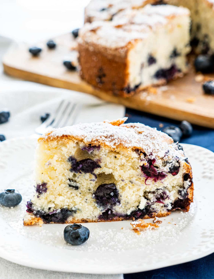 a slice of blueberry cake on a plate