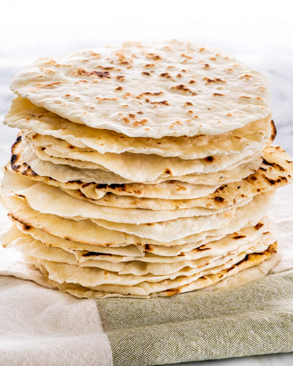 a stack of flour tortillas