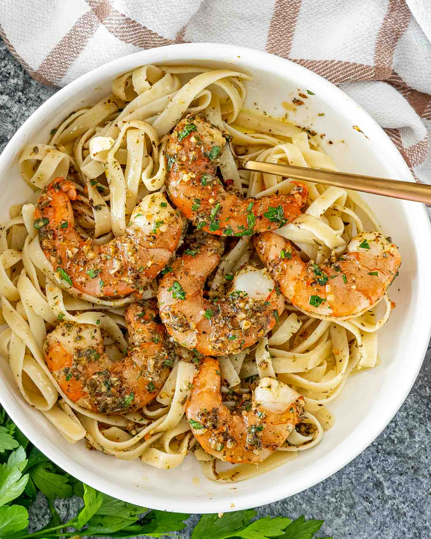 a bowl of pasta with fresh italian shrimp bake.