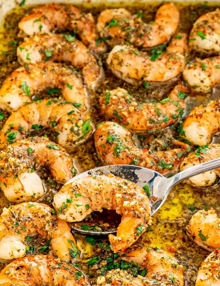 italian shrimp bake fresh out of the oven in a white casserole dish.
