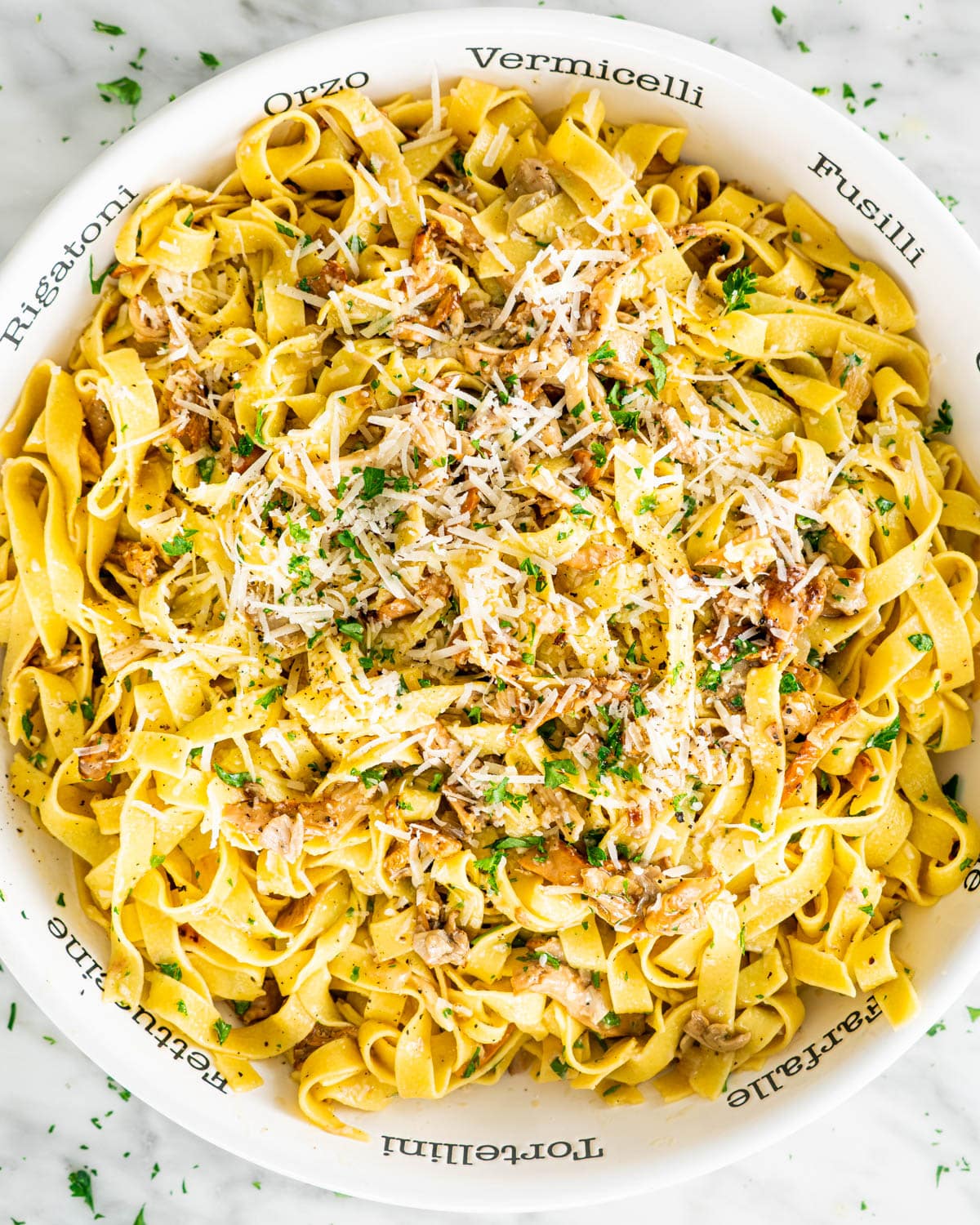 a bowl loaded with Chanterelle Mushrooms with Tagliatelle