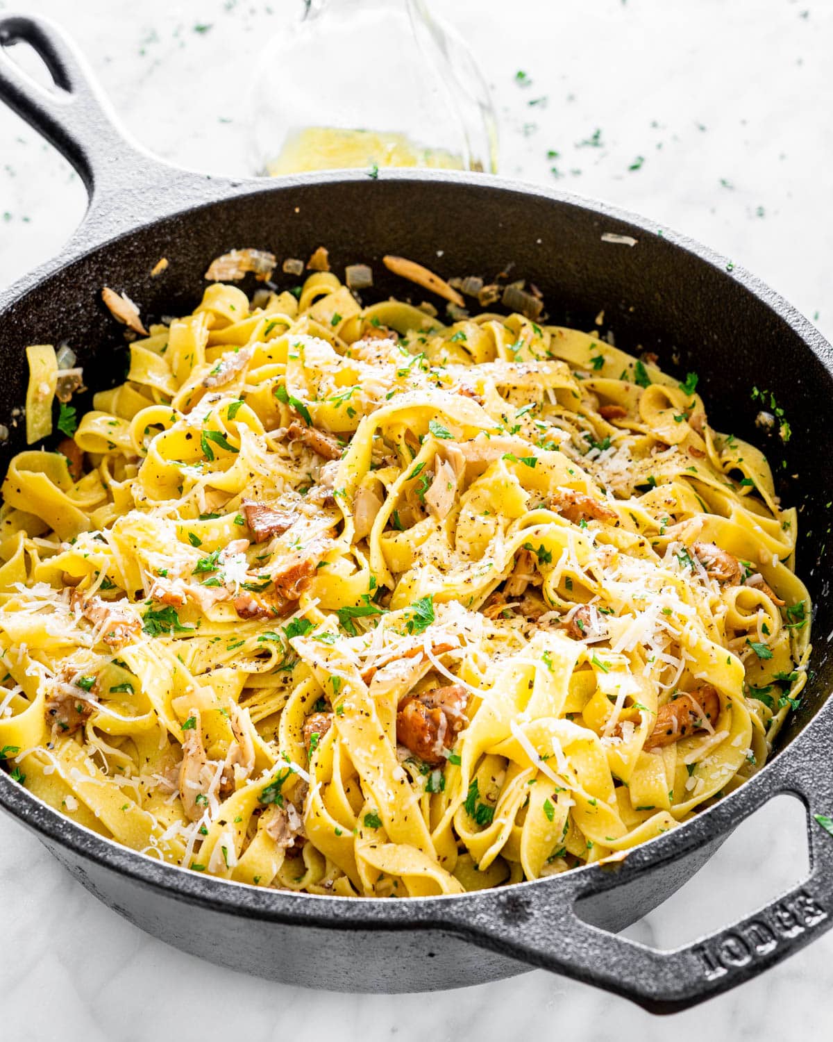 Chanterelle Mushrooms with Tagliatelle in a skillet
