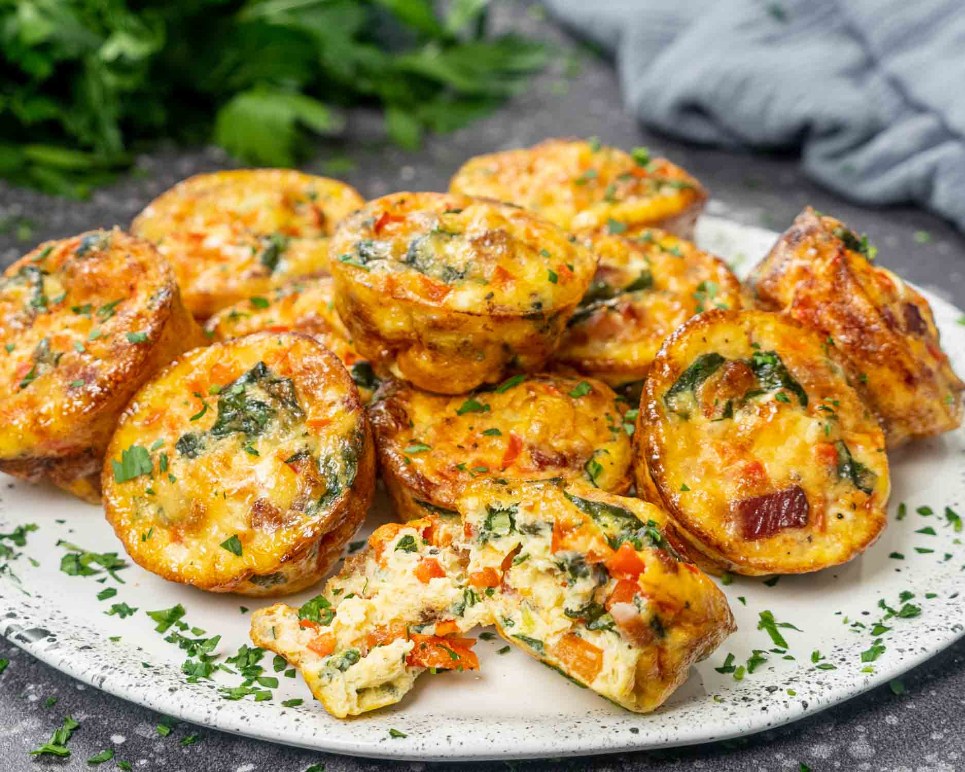 a bunch of egg muffins on a platter.