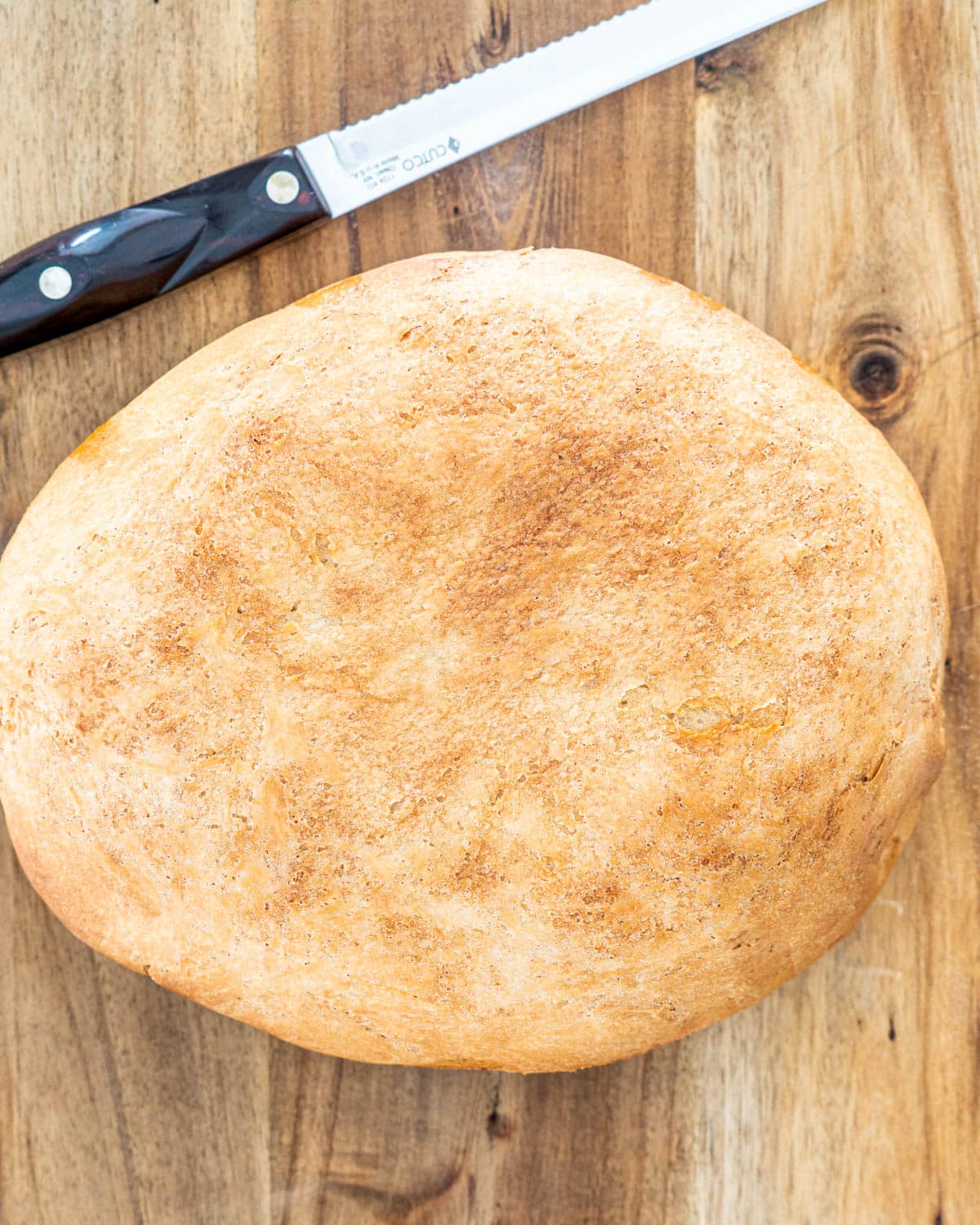 Slow Cooker Bread on a cutting board