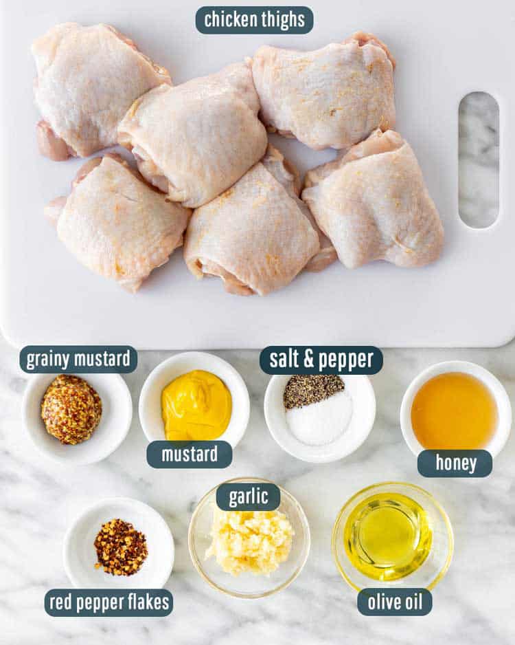 overhead shot of all the ingredients needed to make oven baked chicken thighs