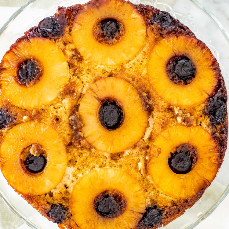 overhead shot of a gorgeous pineapple upside down cake on a cake platter