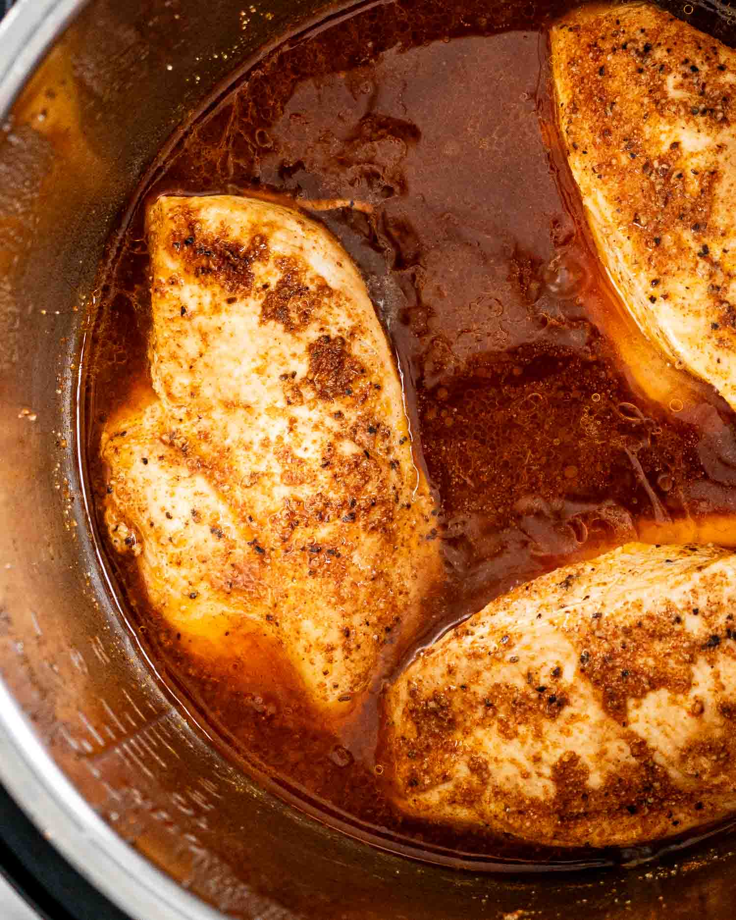 bbq chicken breasts with sauce in an instant pot.