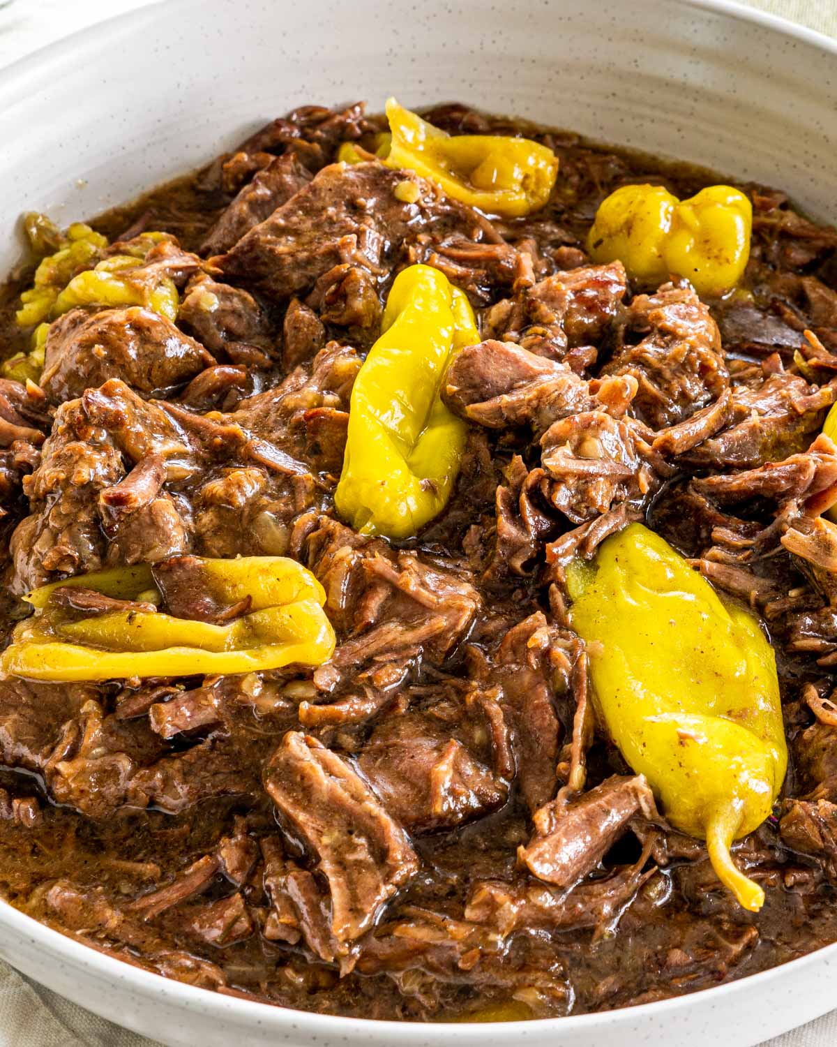 mississippi pot roast in a white bowl