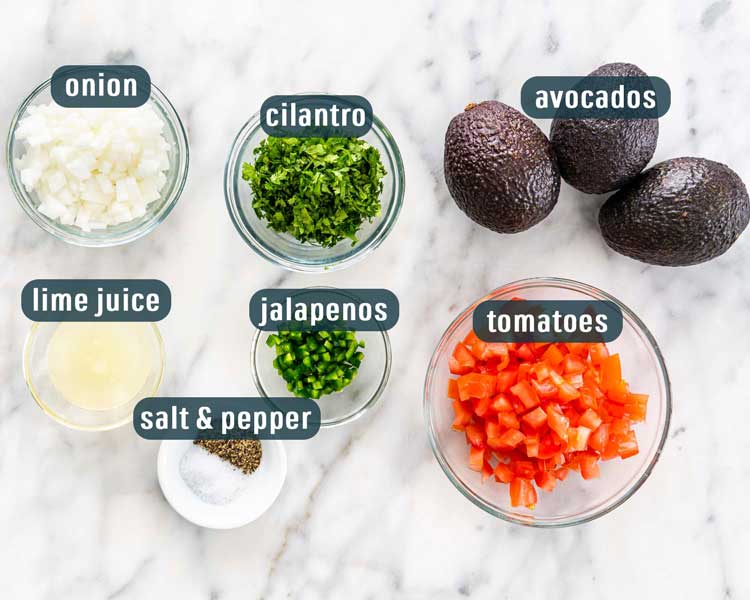 overhead shot of all the ingredients needed to make guacamole