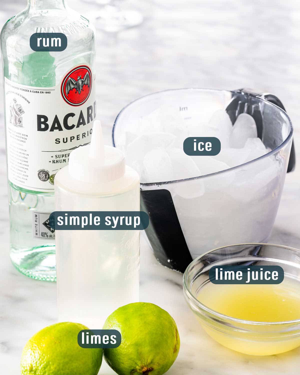 all ingredients on a counter needed to make daiquiri.