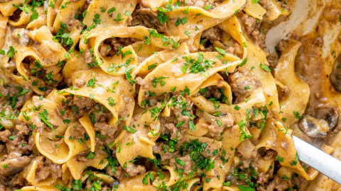 beef stroganoff with noodles in a dutch oven.