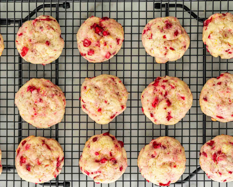 cranberry orange cookies cooling on a wire rack.