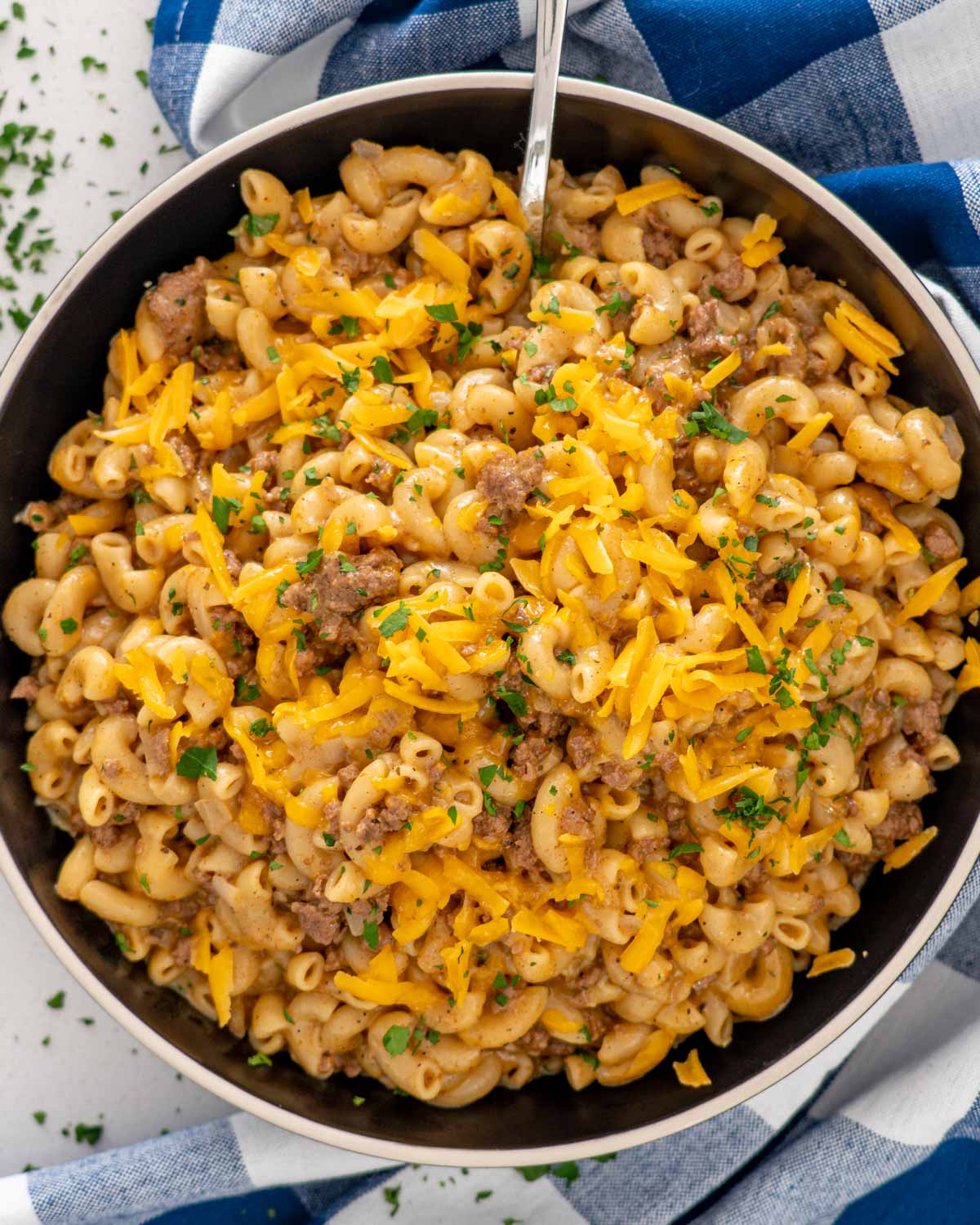 hamburger helper in a bowl with a serving spoon inside.