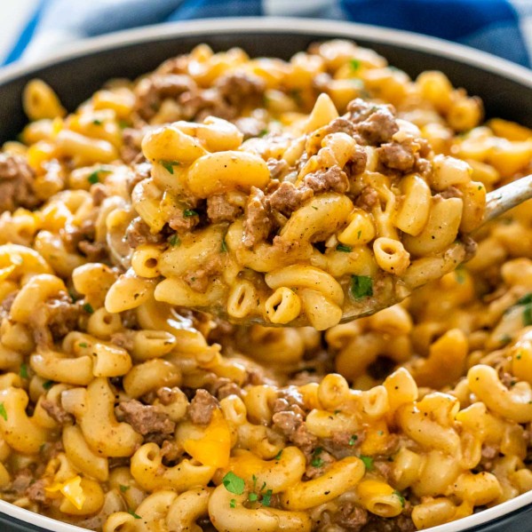hamburger helper in a bowl with a serving spoon inside.
