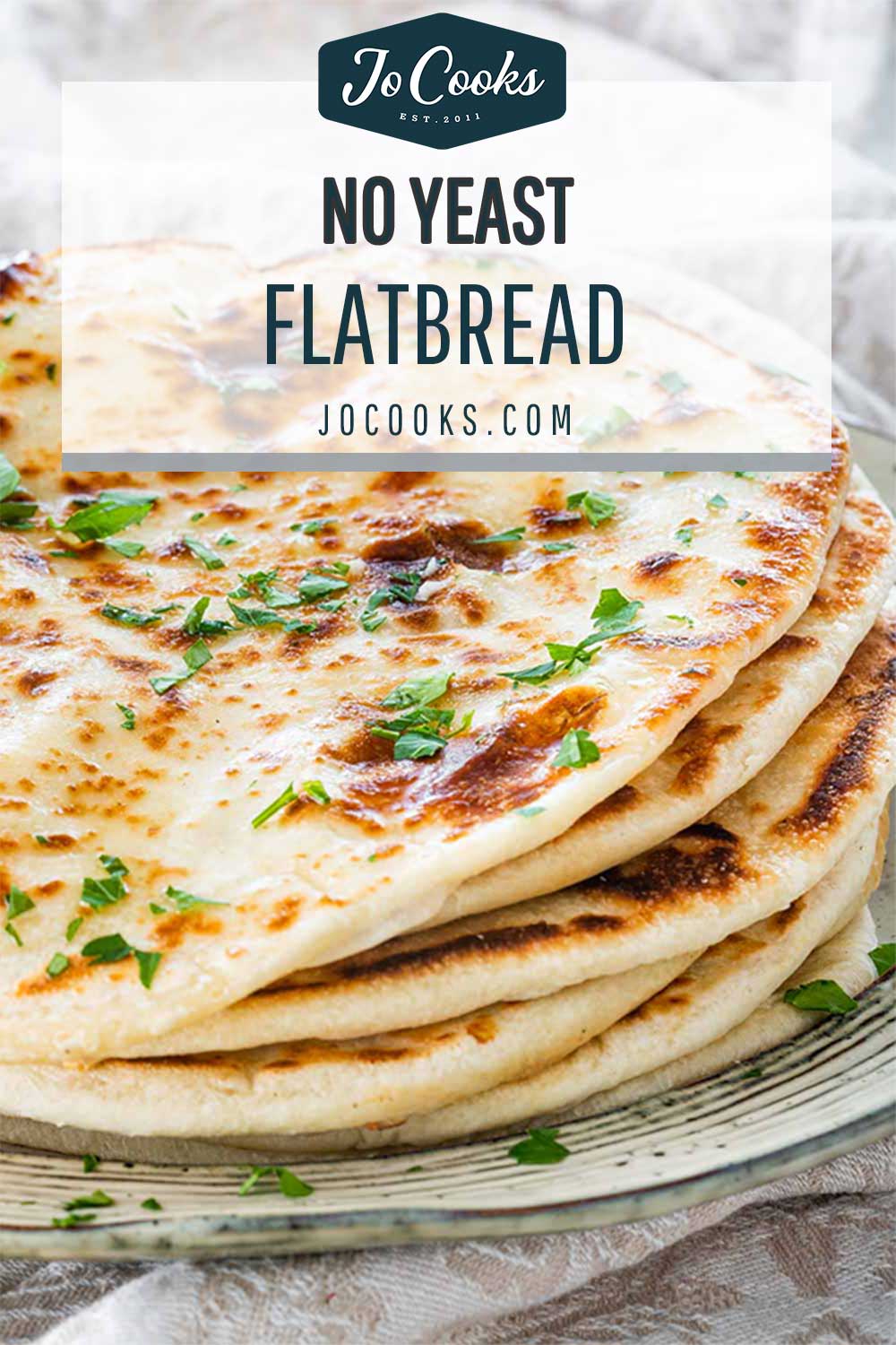 pin for a stack of flatbreads on a plate.