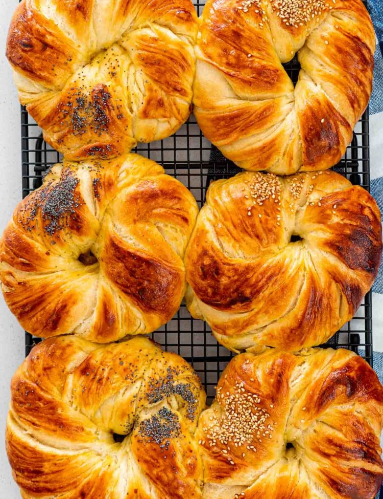 overhead shot of brioche buns cooling on a cooling rack.