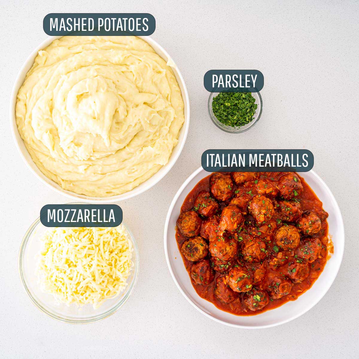 overhead shot of ingredients needed to make meatball mashed potato casserole.