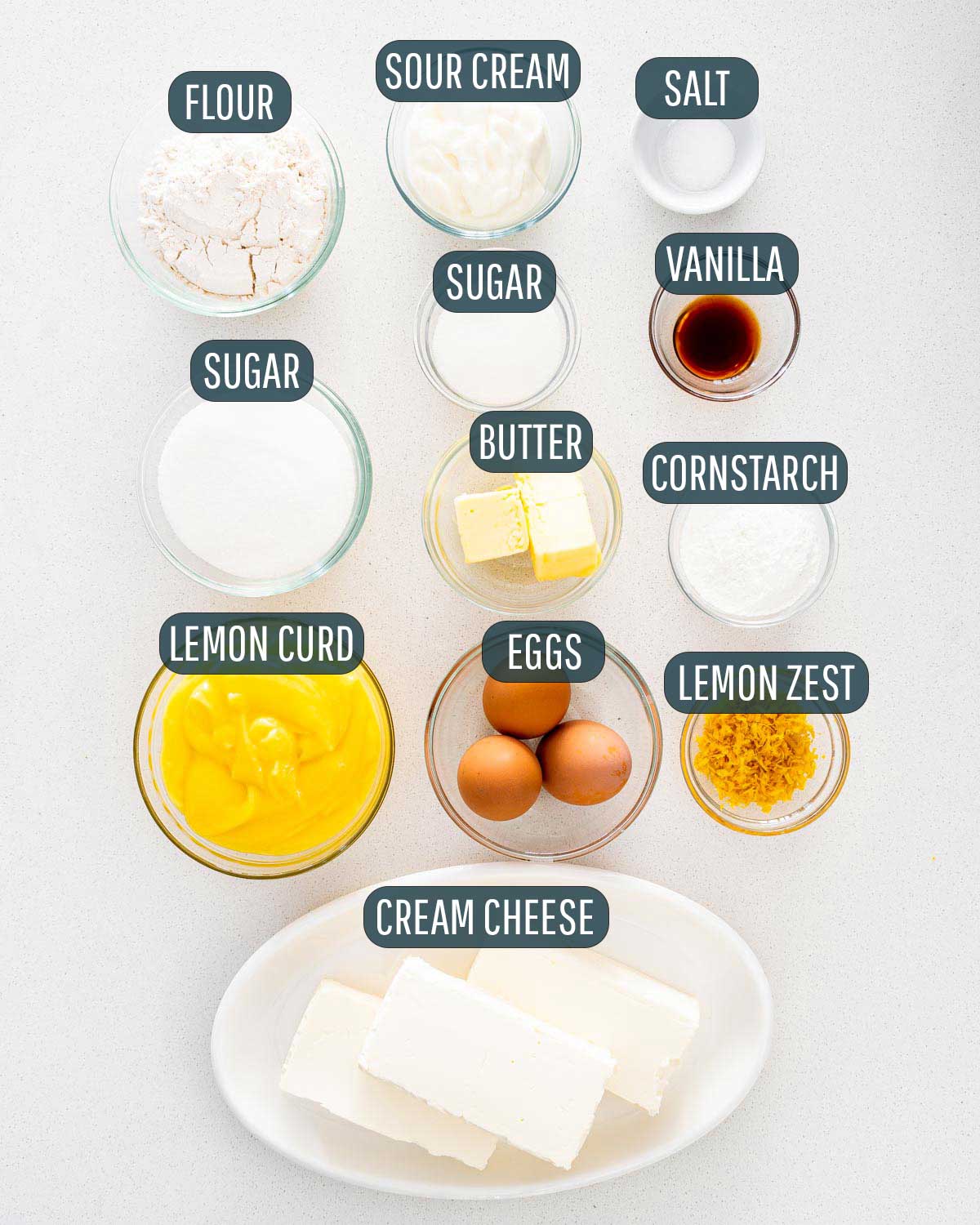 overhead shot of all the ingredients needed to make lemon cheesecake bars.