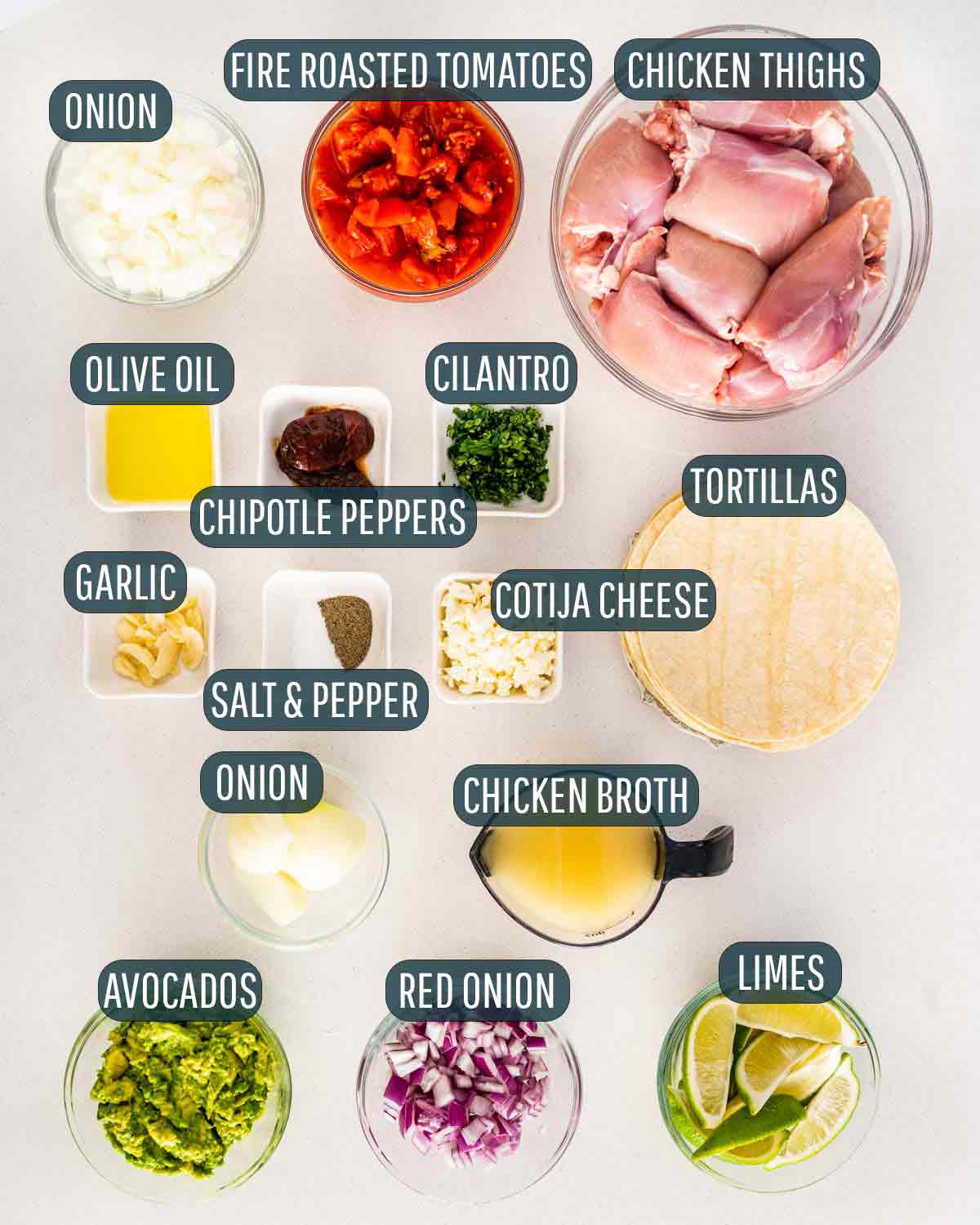 overhead shot of all ingredients needed to make chicken tinga.