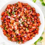 freshly made pico de gallo in a white bowl.