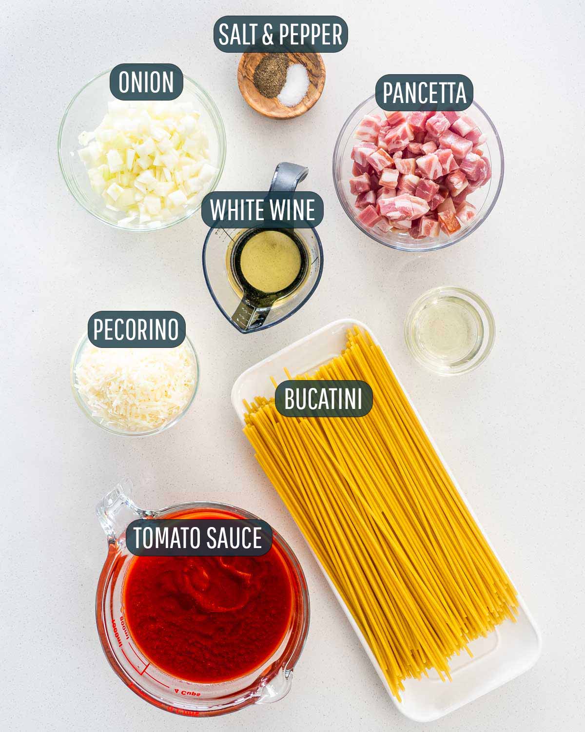overhead shot of all the ingredients needed to make bucatini all'amatriciana.
