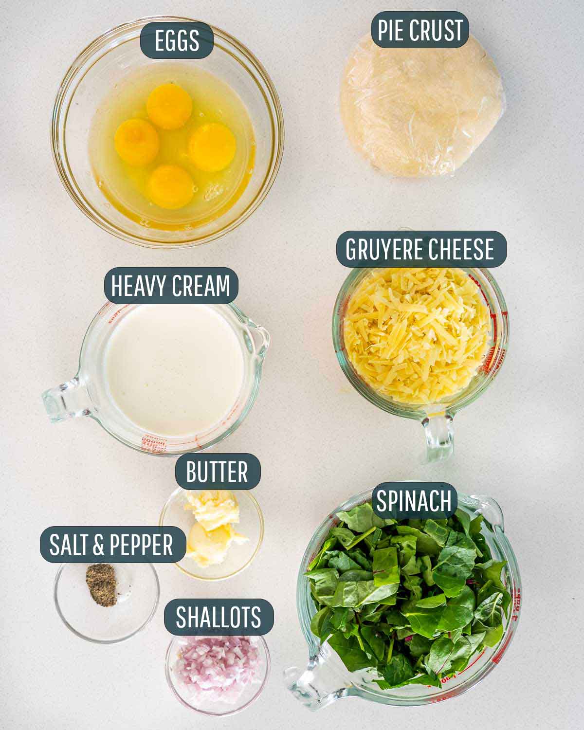 overhead shot of all the ingredients needed to make quiche florentine.