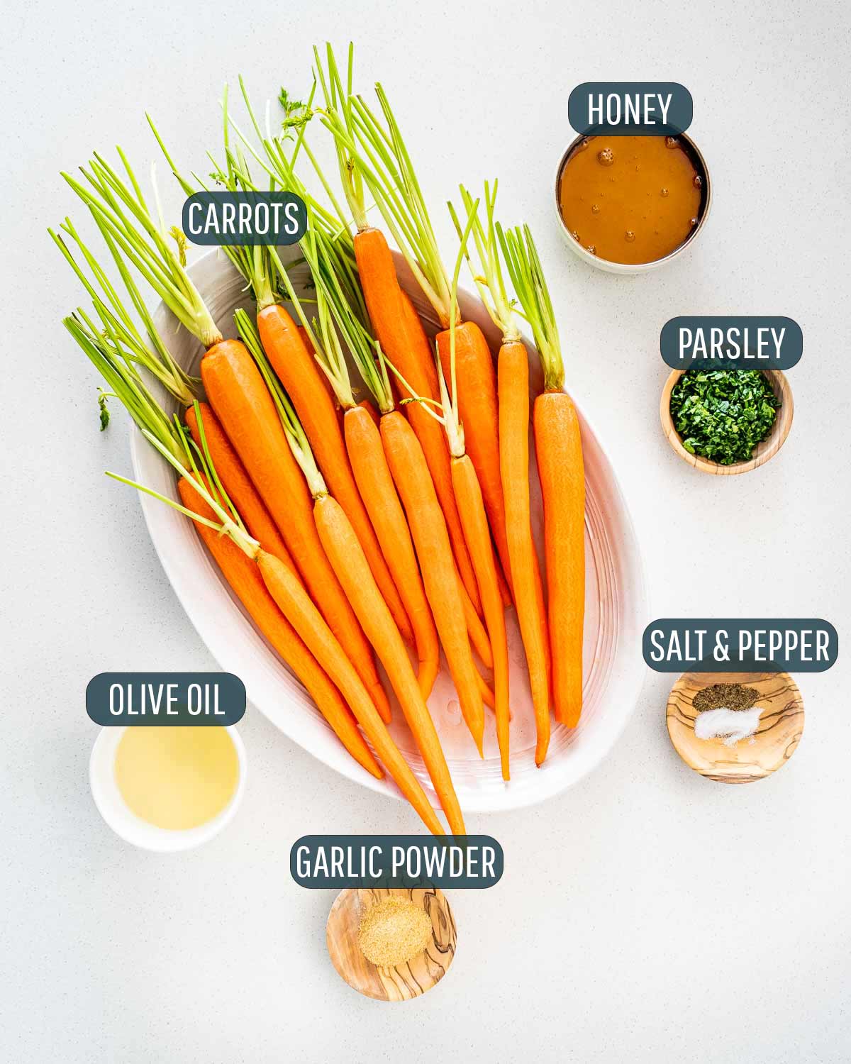 overhead shot of ingredients needed to make honey roasted carrots.