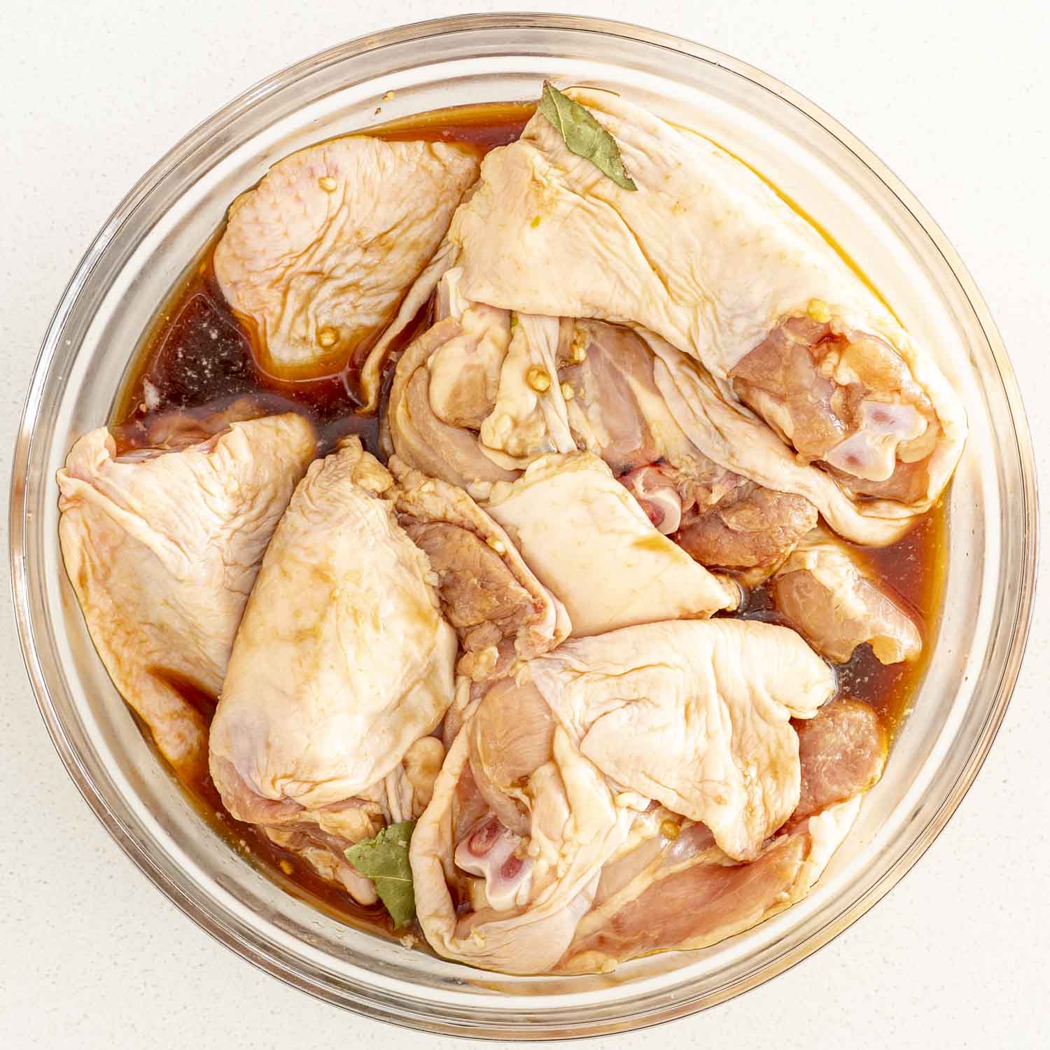 process shots showing how to make chicken adobo.