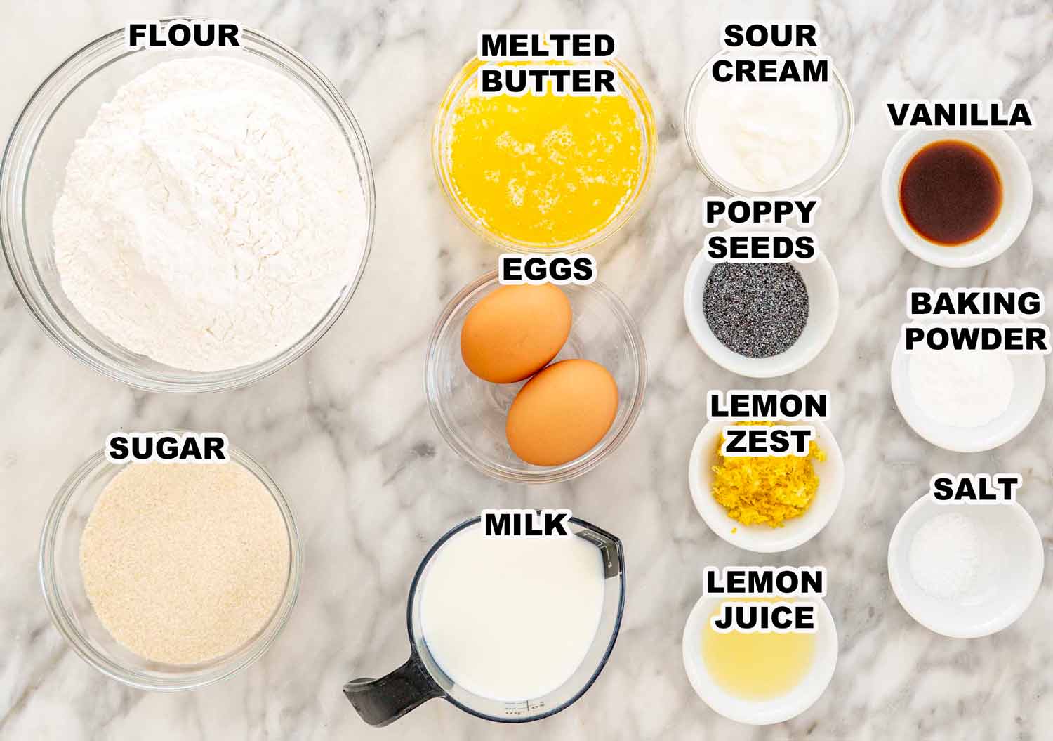 ingredients needed to make lemon poppy seed muffins.