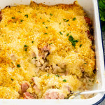freshly baked chicken cordon bleu casserole in a white casserole dish.