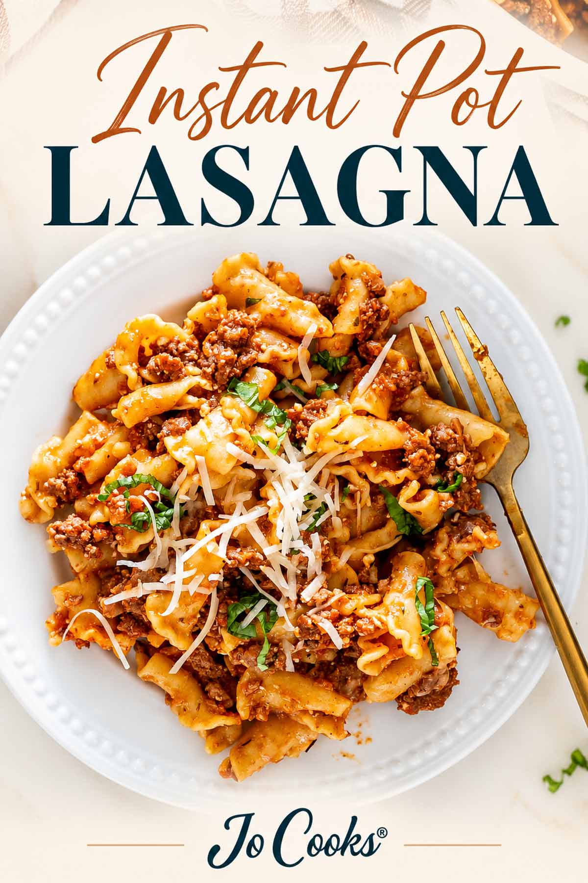 Plated Instant Pot lasagna topped with Parmesan and basil, beneath copper and teal recipe lettering, with Jo Cooks logo below.