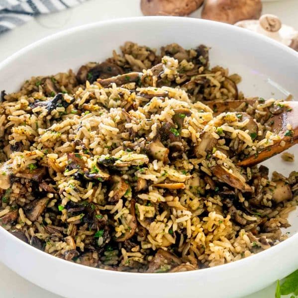 mushroom rice in a large white bowl.