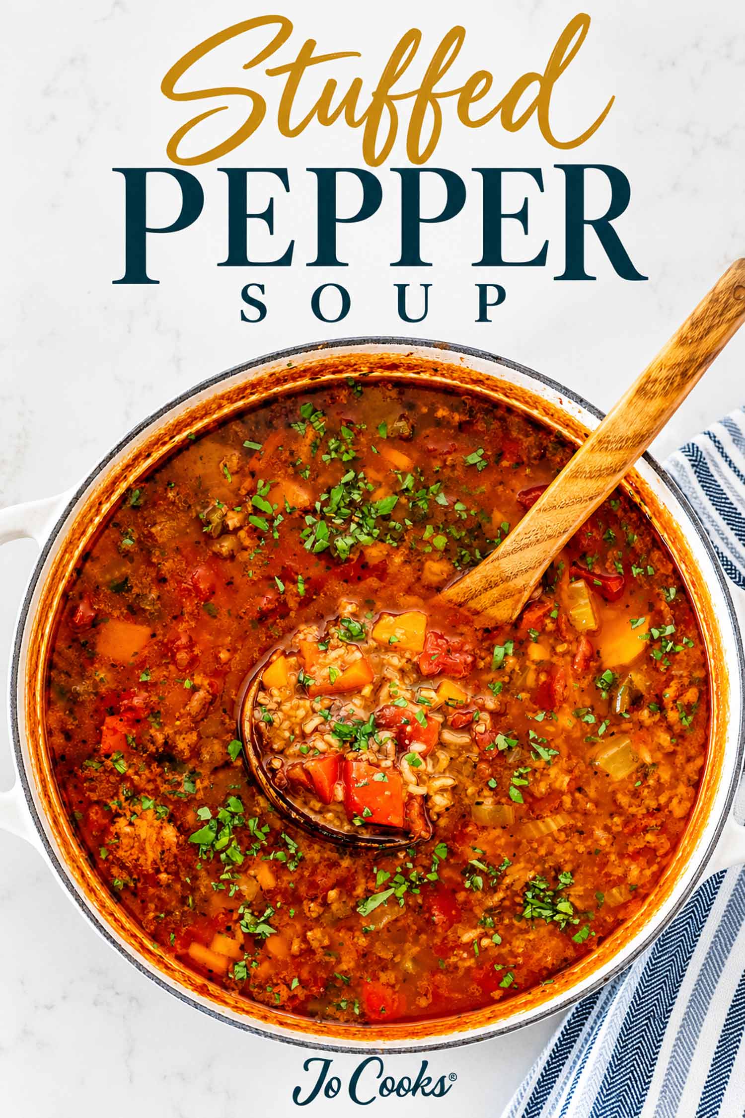Overhead view of stuffed pepper soup with rice, ground beef and vegetables in a white pot, with recipe title.