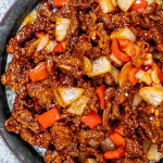 freshly made beijing beef on a serving platter.