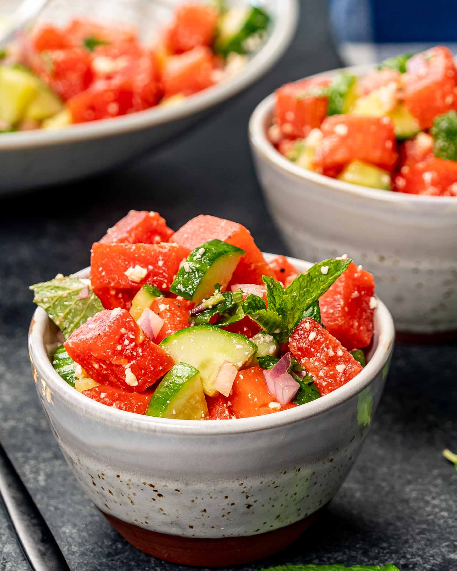 two small bowls with fresh watermelon salad.
