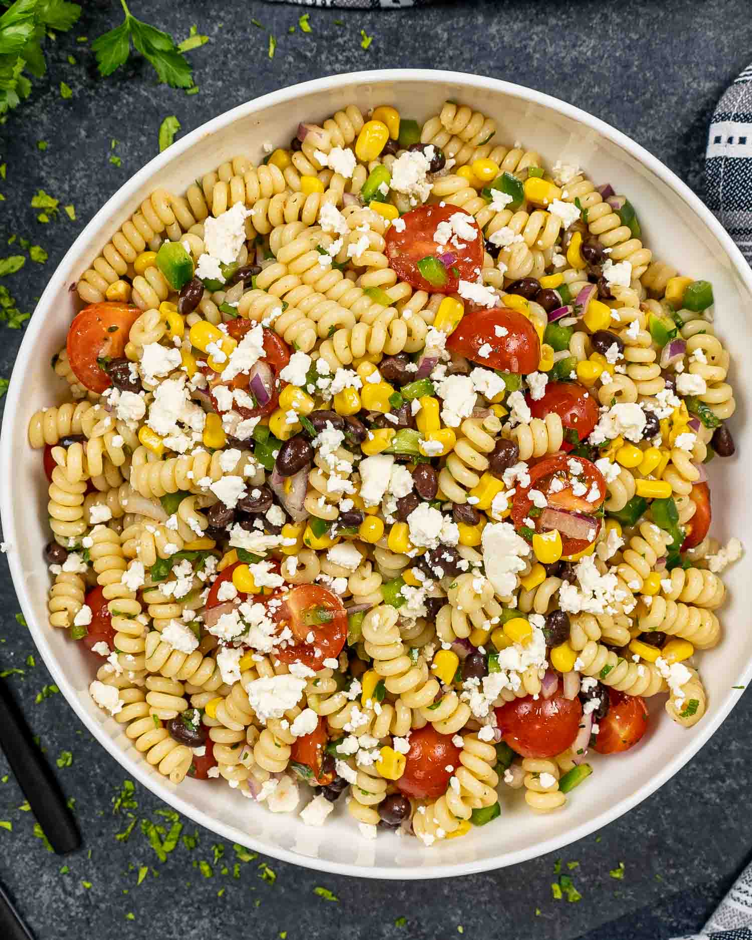 a serving of southwest pasta salad in a white bowl.