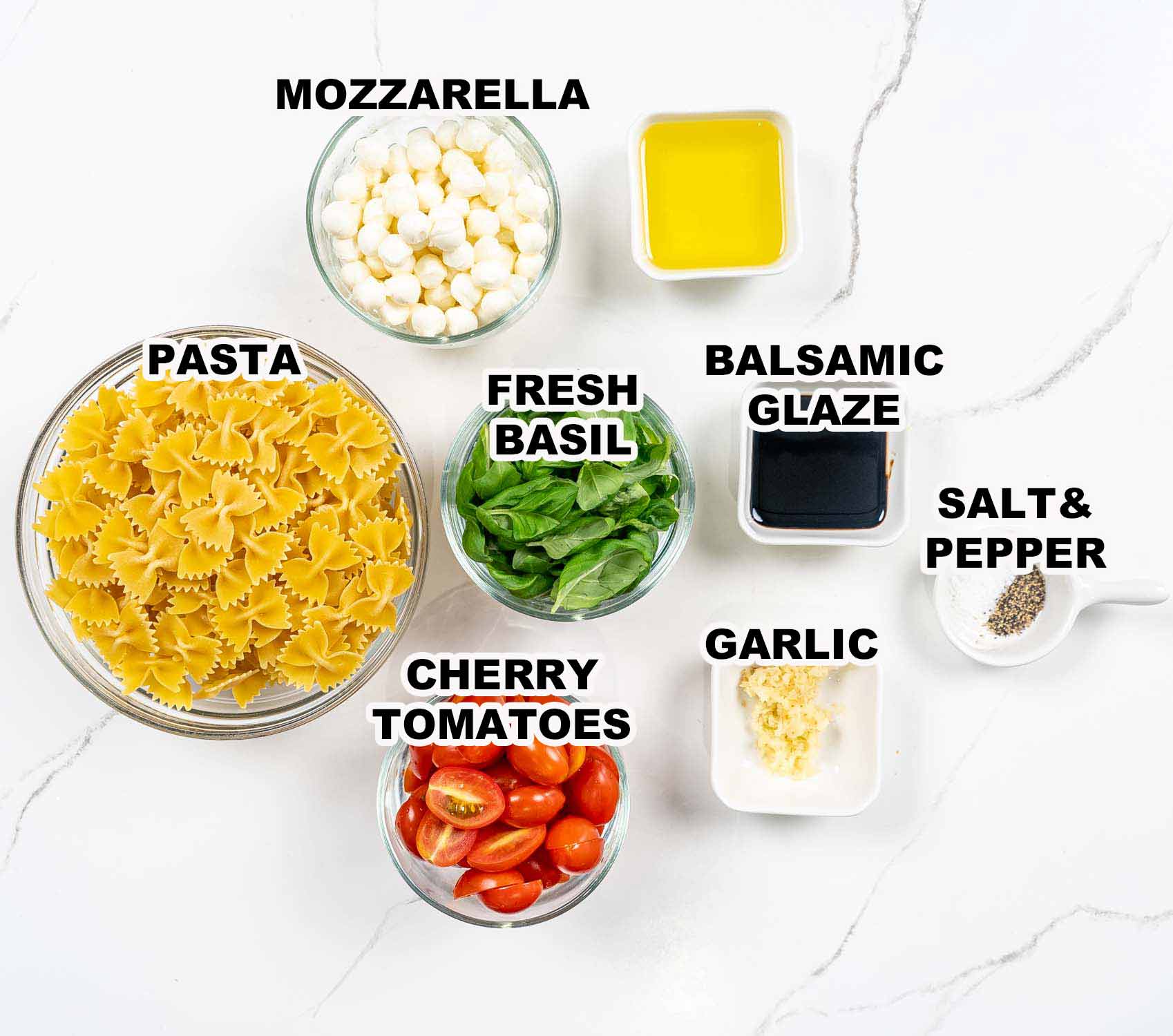 ingredients needed to make caprese pasta salad.