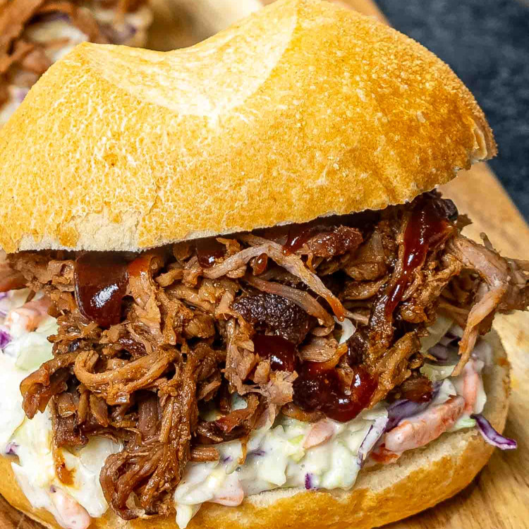 pulled pork sandwich with coleslaw.