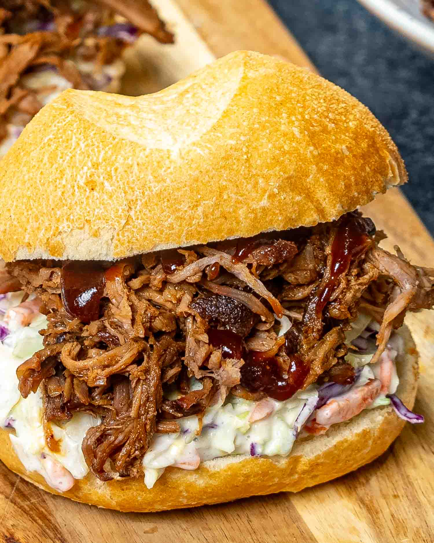 pulled pork sandwich with coleslaw.