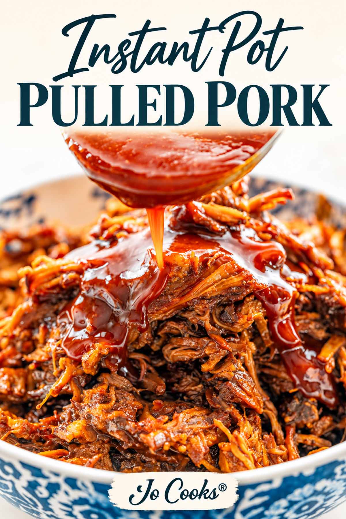 Barbecue sauce pouring over Instant Pot pulled pork in a patterned bowl, with recipe title and Jo Cooks® logo.